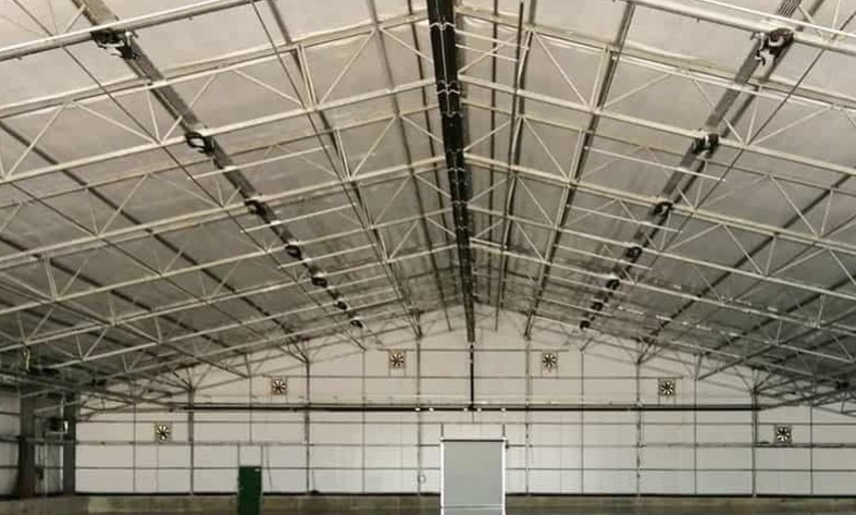 Repairing warehouse roofs with resin